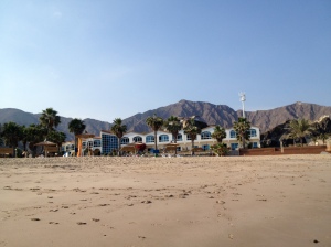 View from the beach looking back toward shore and the mountains