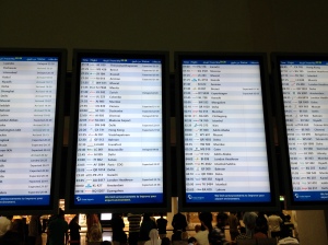 Arrivals board at Dubai airport...check out where the flights originate from...2 boards in English, 2 in Arabic